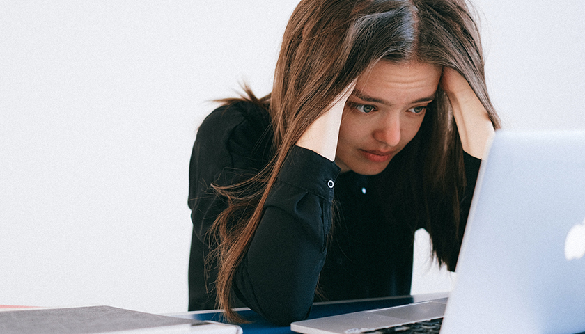 Woman Stressed at Computer